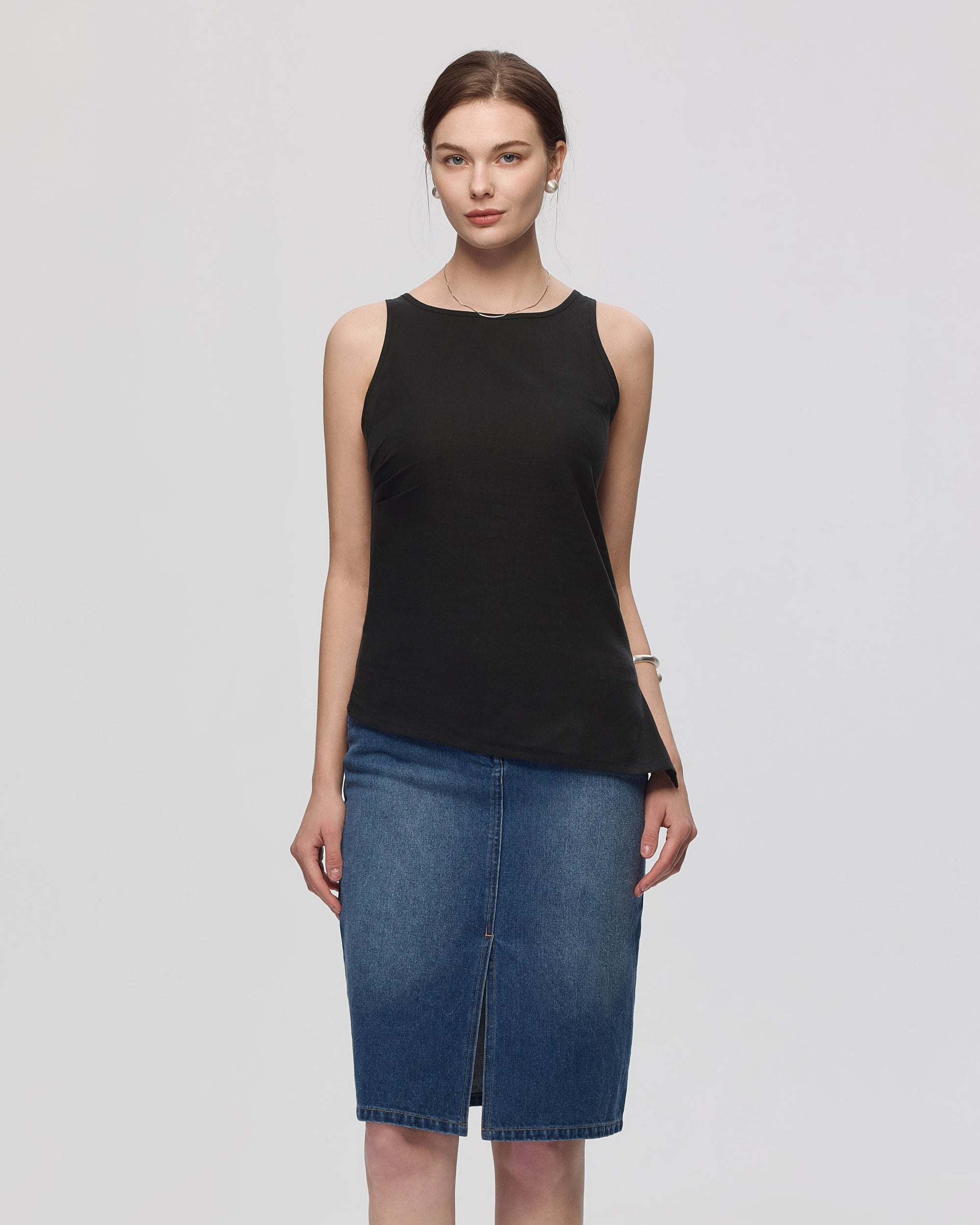 Juana Sienna Pleated Tank black (hemp–cotton) styled on model showing rib-cage pleating