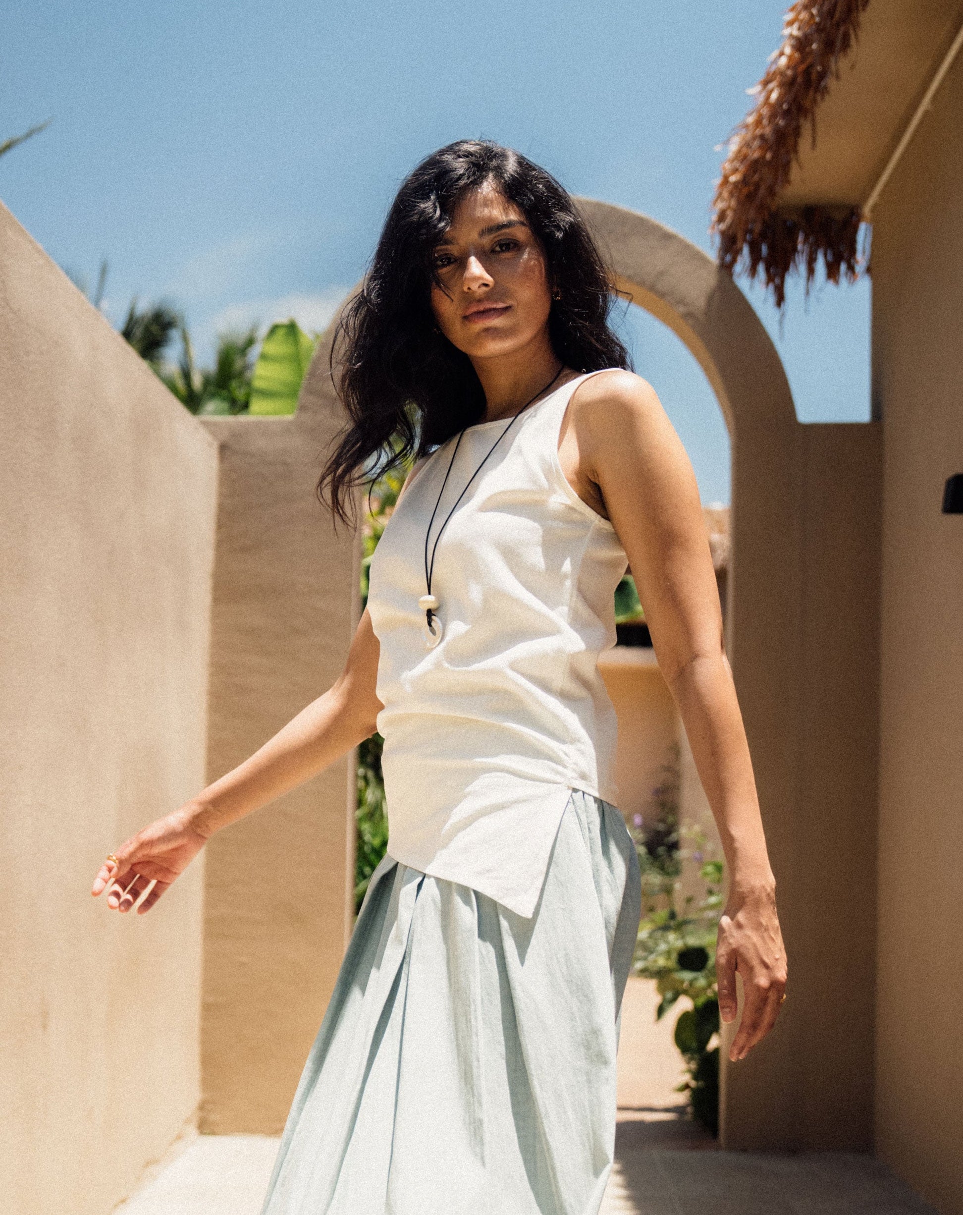 Juana Sienna Pleated Tank white (hemp–cotton) close detail on model showing decorative pleating