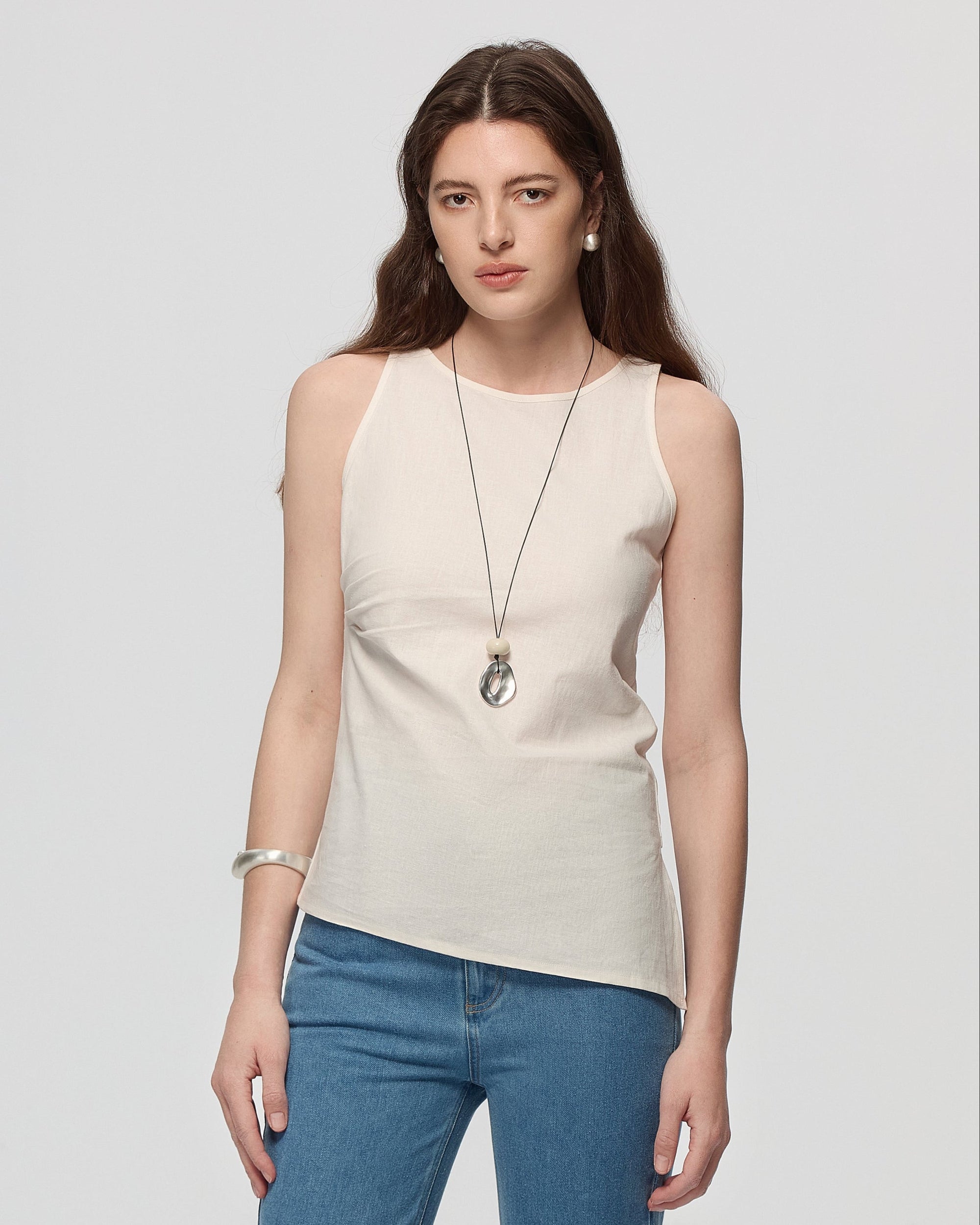 Juana Sienna Pleated Tank white (hemp–cotton) styled on model showing rib-cage pleating