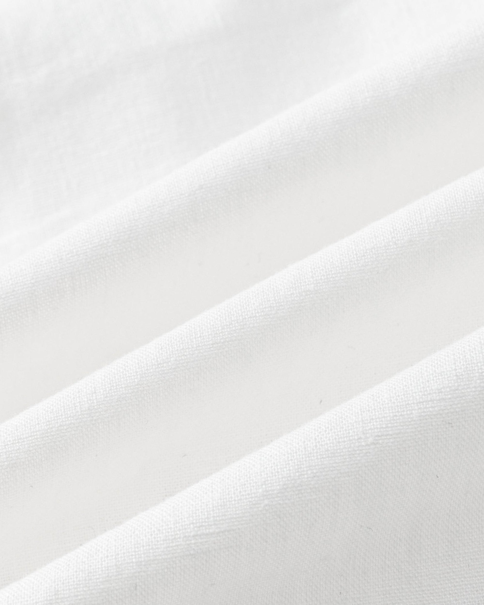Juana Sienna Pleated Tank white (hemp–cotton) textile close-up showing breathable weave texture