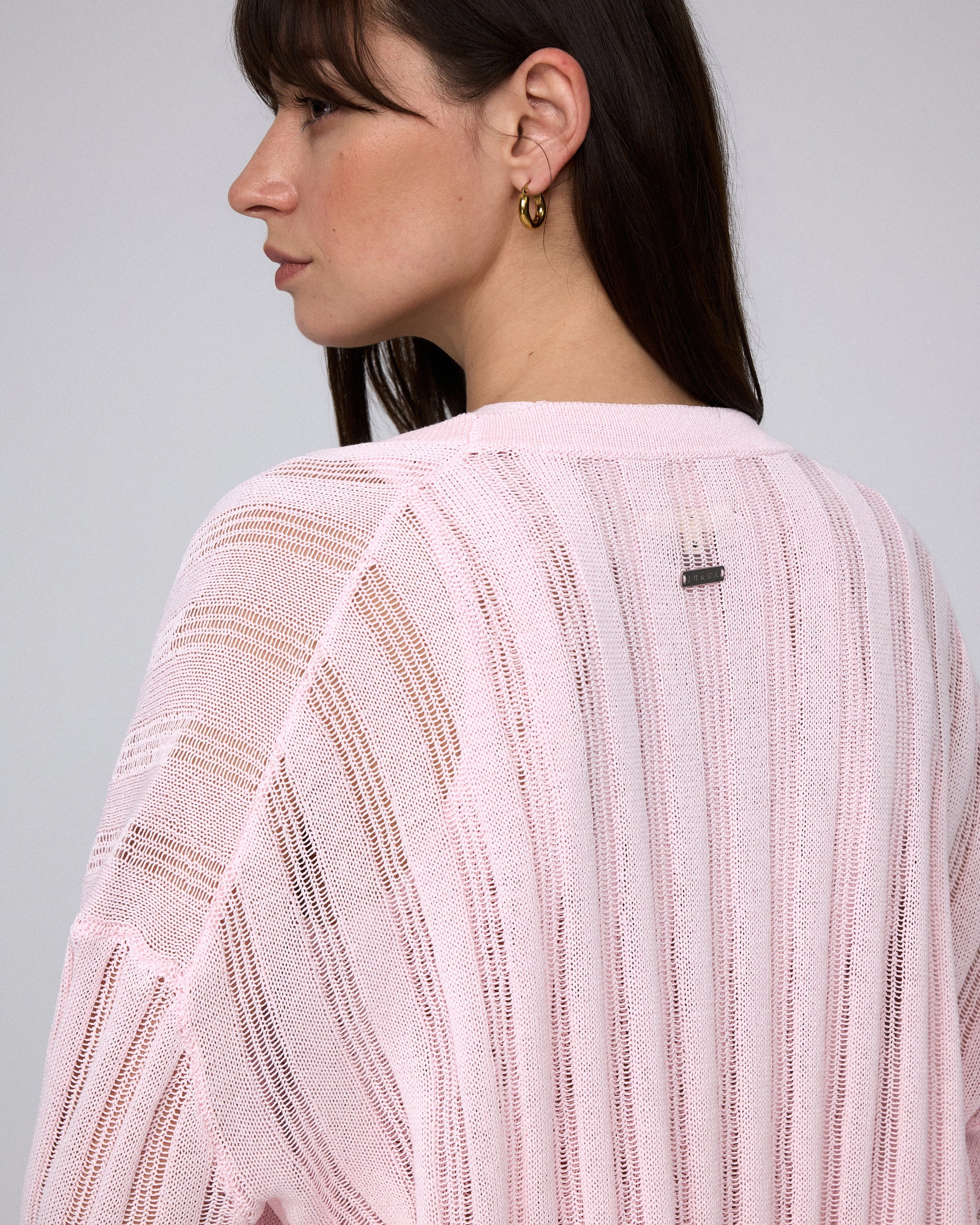 Juana Sumire Open Knit Striped Cardigan light pink (cotton–cellulose–rayon blend) model back view with open knit construction