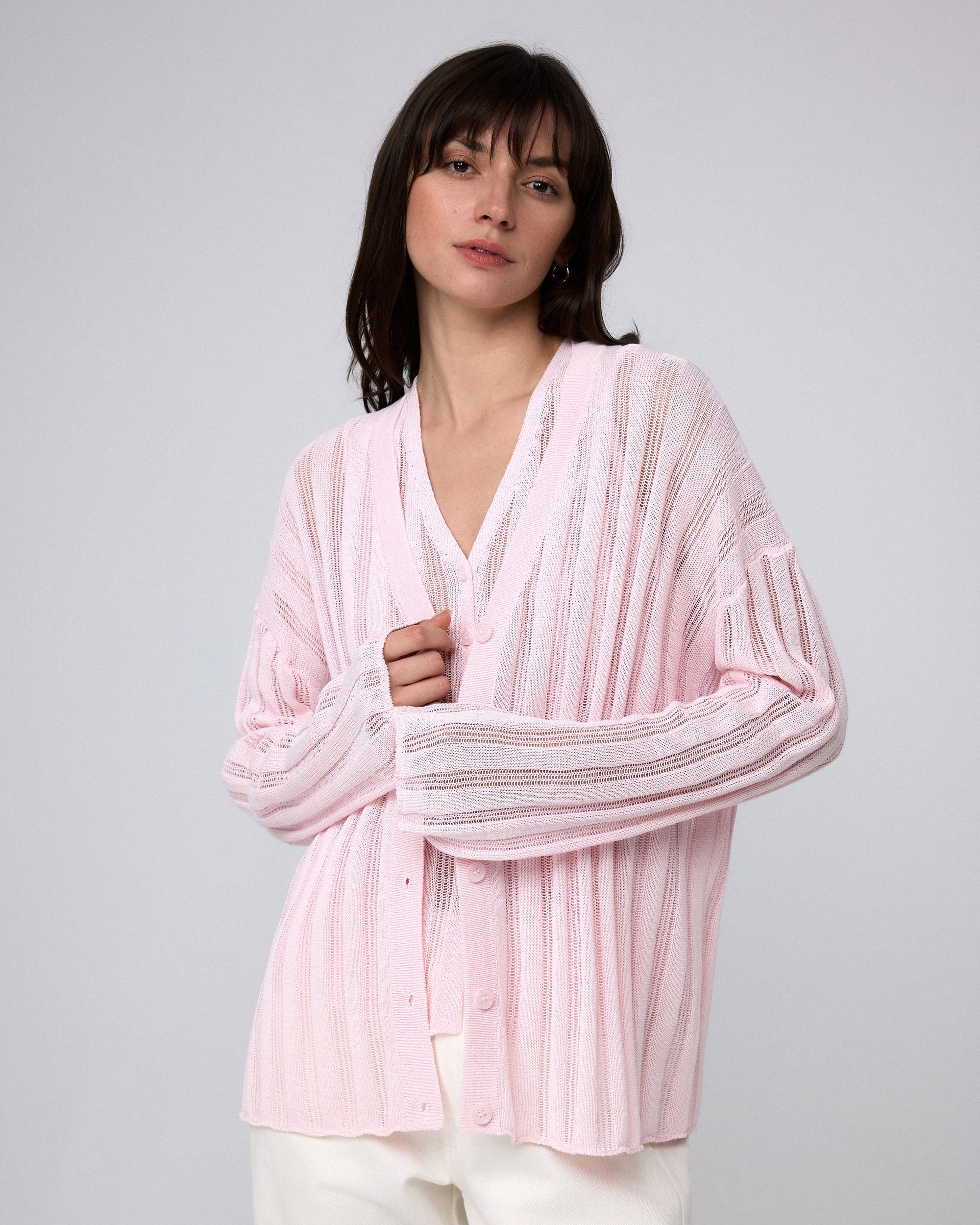 Juana Sumire Open Knit Striped Cardigan light pink (cotton–cellulose–rayon blend) model look 1 showing lightweight layering