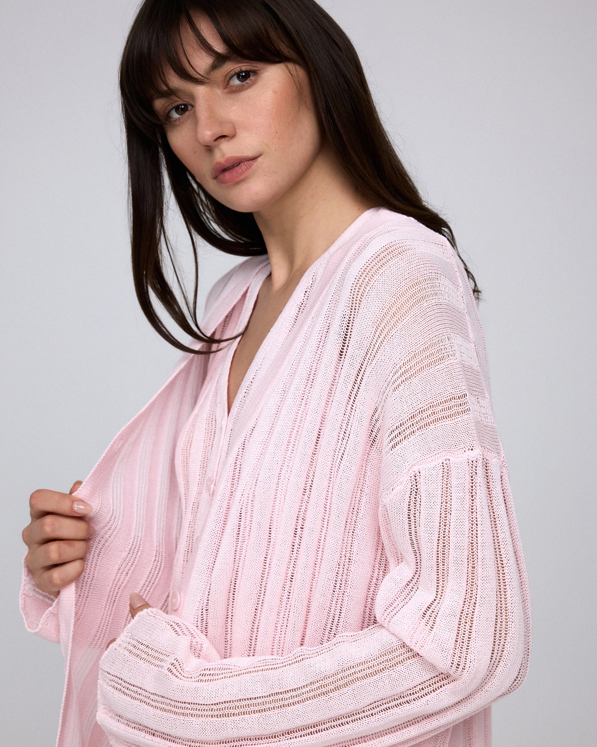 Juana Sumire Open Knit Striped Cardigan light pink (cotton–cellulose–rayon blend) model look 2 highlighting dobby stripe texture