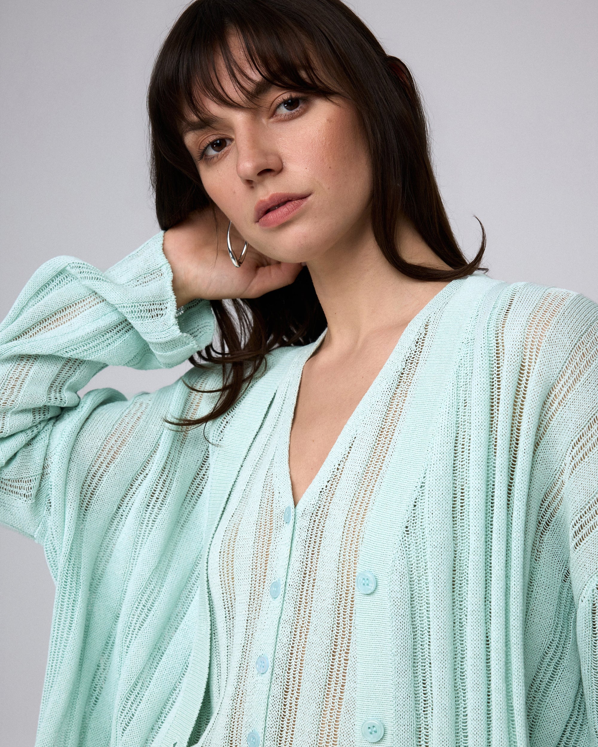 Juana Sumire Open Knit Striped Cardigan seafoam (cotton–cellulose–rayon blend) model detail view of textured stripe