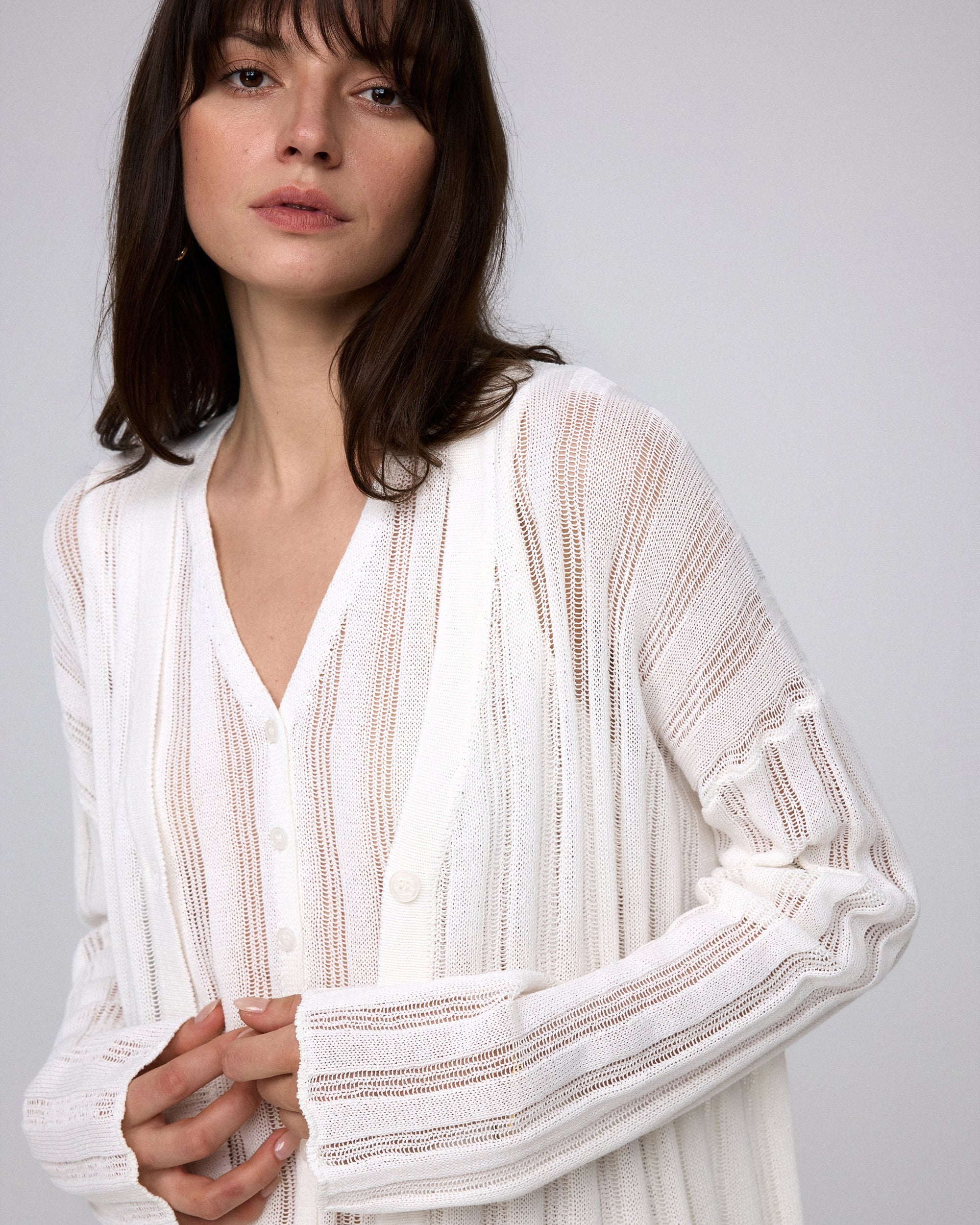 Juana Sumire Open Knit Striped Cardigan white (cotton–cellulose–rayon blend) model detail view of textured stripe
