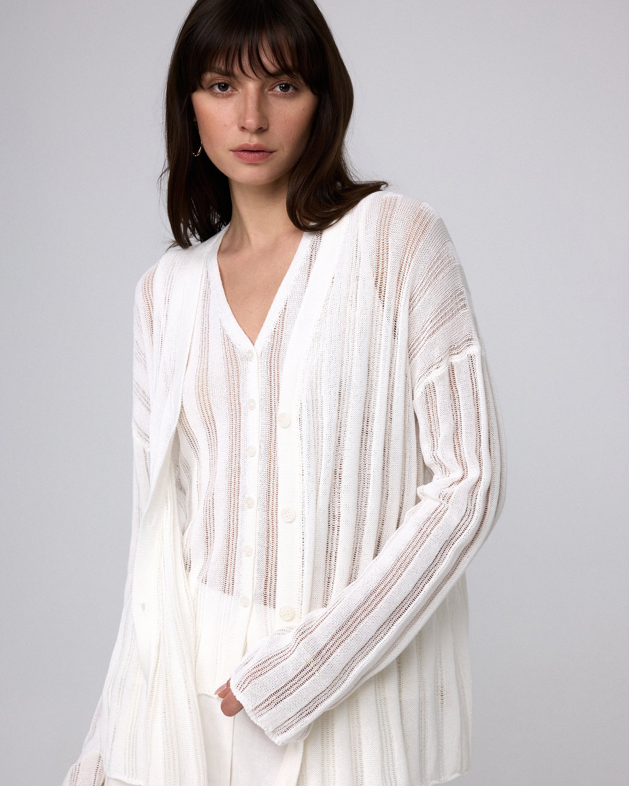 Juana Sumire Open Knit Striped Cardigan white (cotton–cellulose–rayon blend) model main view with relaxed fit