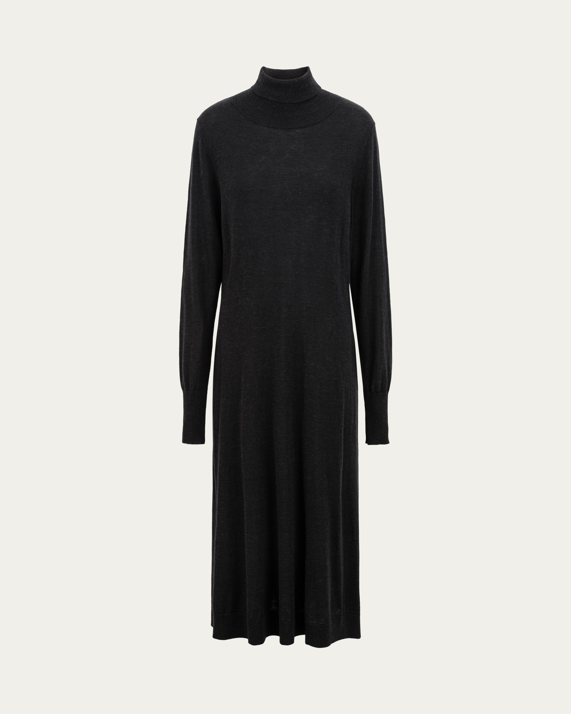 Juana Turtleneck Maxi Dress in Black (merino wool–hemp–silk blend) shown from the front with its turtleneck, bishop sleeves, and A-line skirt.