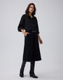 Juana Wide Leg Culotte Shorts Black (hemp–cotton) styled in a complete outfit with the narrow waistband visible
