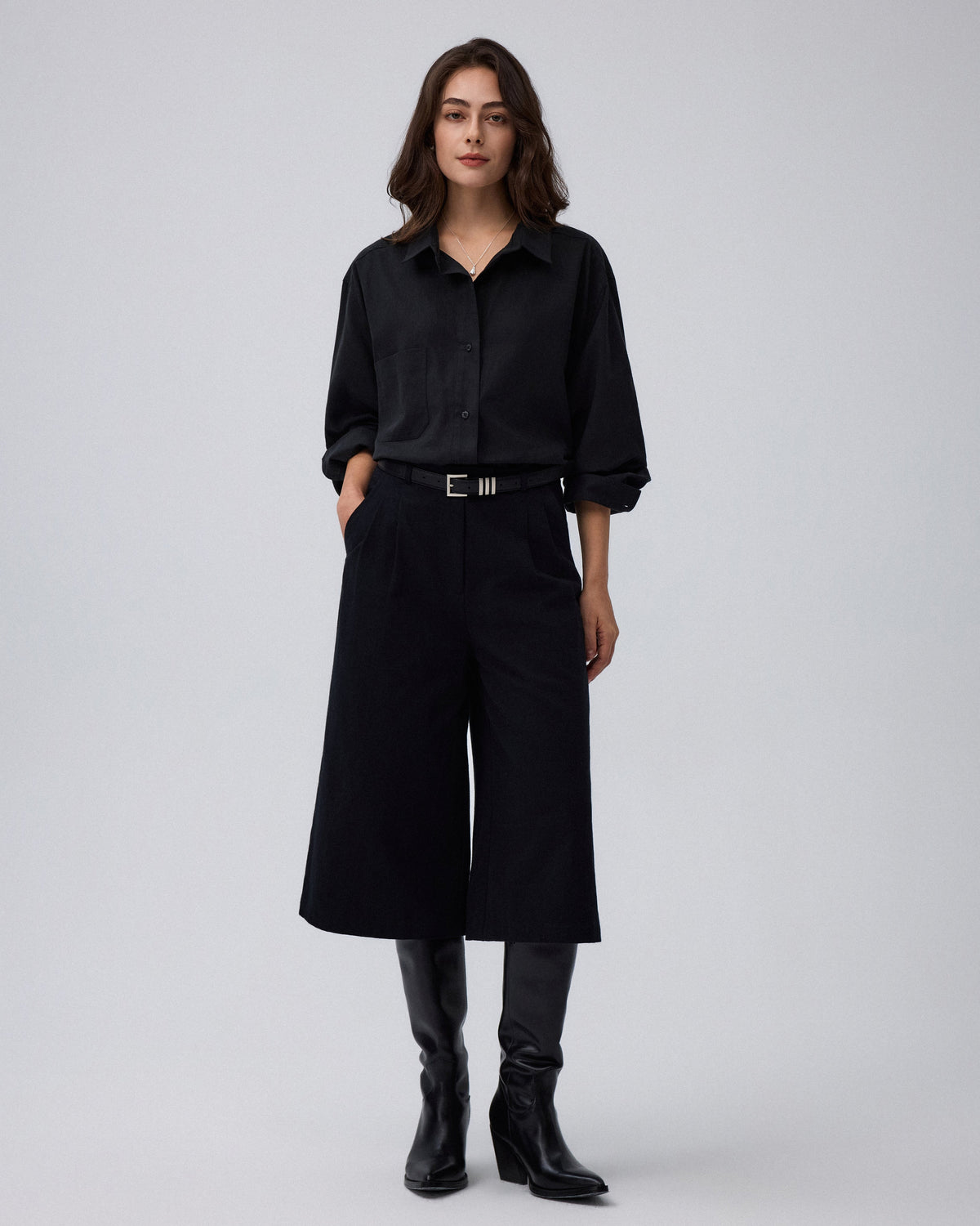 Juana Wide Leg Culotte Shorts Black (hemp–cotton) styled in a polished daytime look with front pleats visible