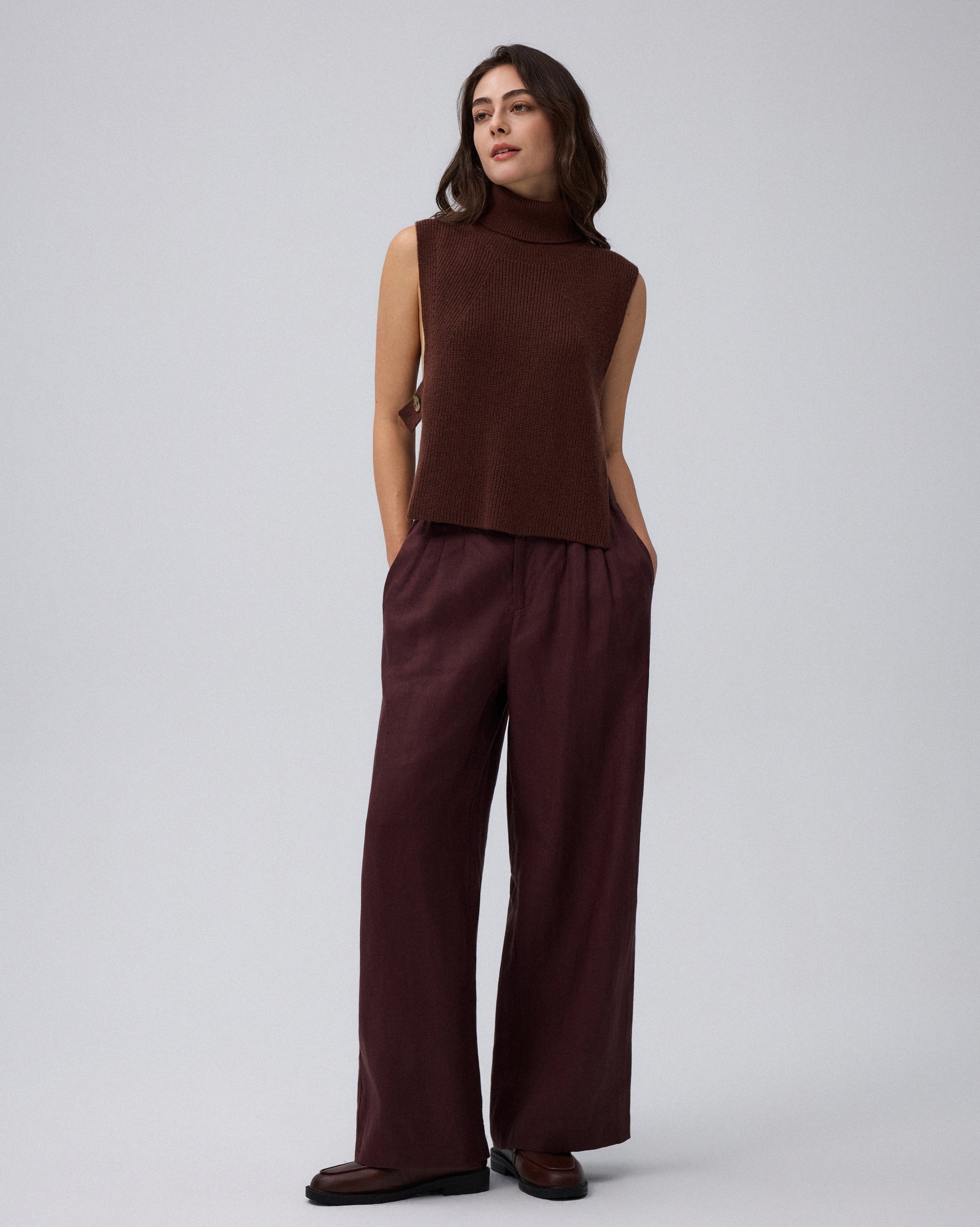 Juana Wool Cashmere Sweater Vest in Chocolate (wool–cashmere) styled in an elevated layered look with the high neckline visible.