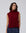 Juana Wool Cashmere Sweater Vest in Pomegranate (wool–cashmere) worn on a model in a front view with the open-side silhouette visible.