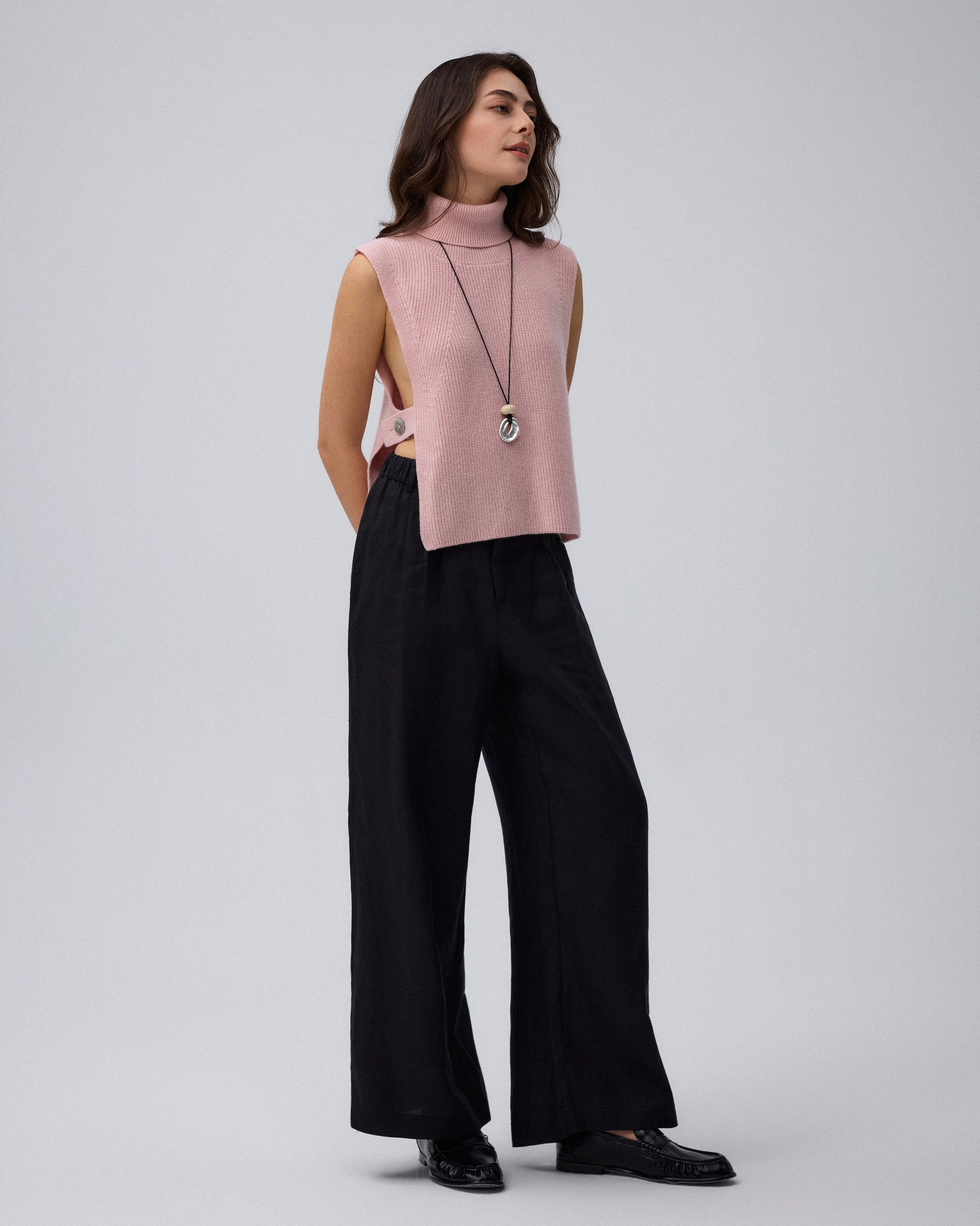 Juana Wool Cashmere Sweater Vest in Rose (wool–cashmere) styled in an elevated layered look with the high neckline visible.