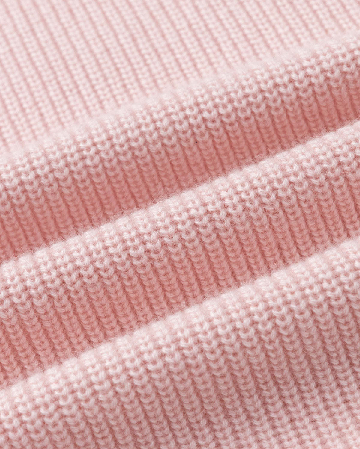 Juana Wool Cashmere Sweater Vest in Rose (wool–cashmere) shown in a textile close-up highlighting the heavyweight chunky rib knit.