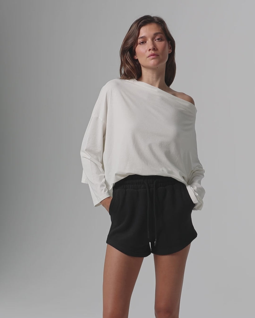 360° video of model wearing Off The Shoulder Top (white), showing fit and movement.