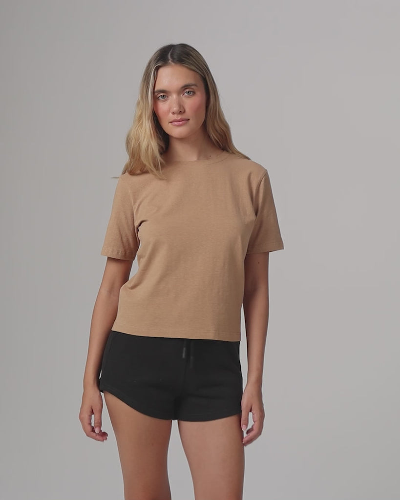 360° video of model wearing Short Sleeve Tee (fawn), showing fit, drape, and movement.