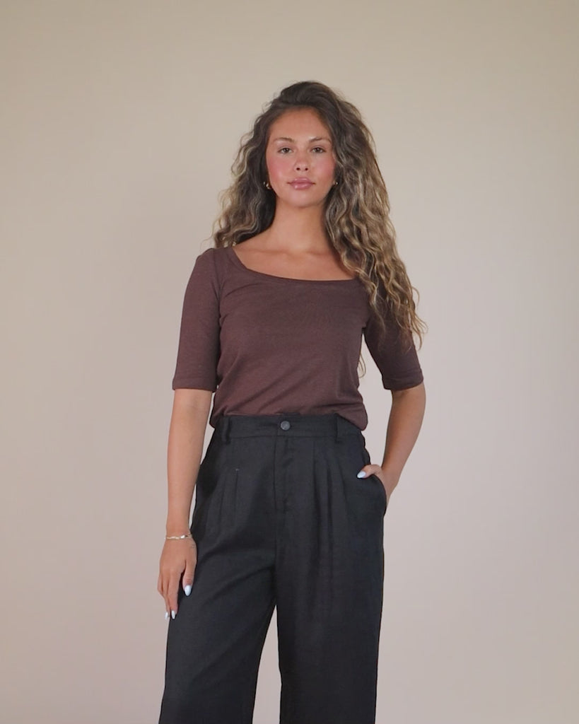 360-degree video of model wearing the Asymmetrical Neckline Tee, showing fit, drape, and neckline from all angles.