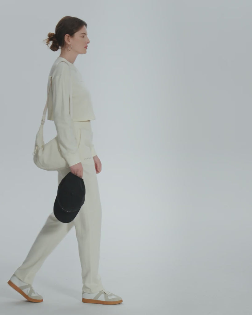 Juana Off Hours Natural Mid Rise Joggers cream (hemp–organic cotton) 360 view showing relaxed tapered silhouette on model