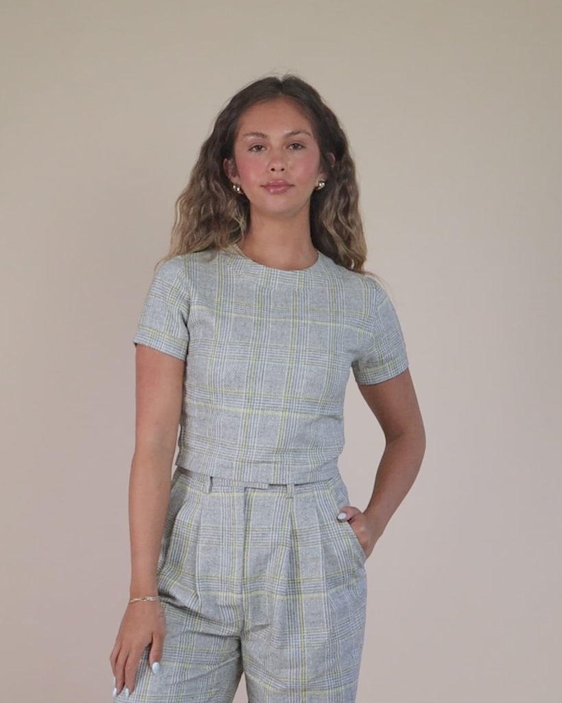 360-degree video of model wearing Juana Plaid Theory Top, showing design from all angles.